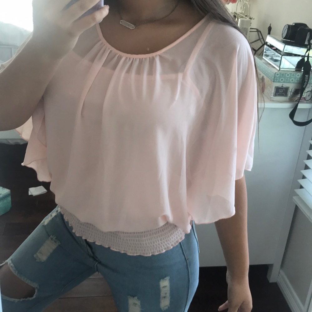 light pink flowy blouse with undershirt